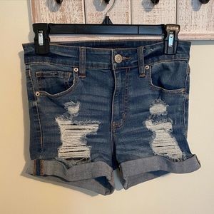 ripped blue jean shorts